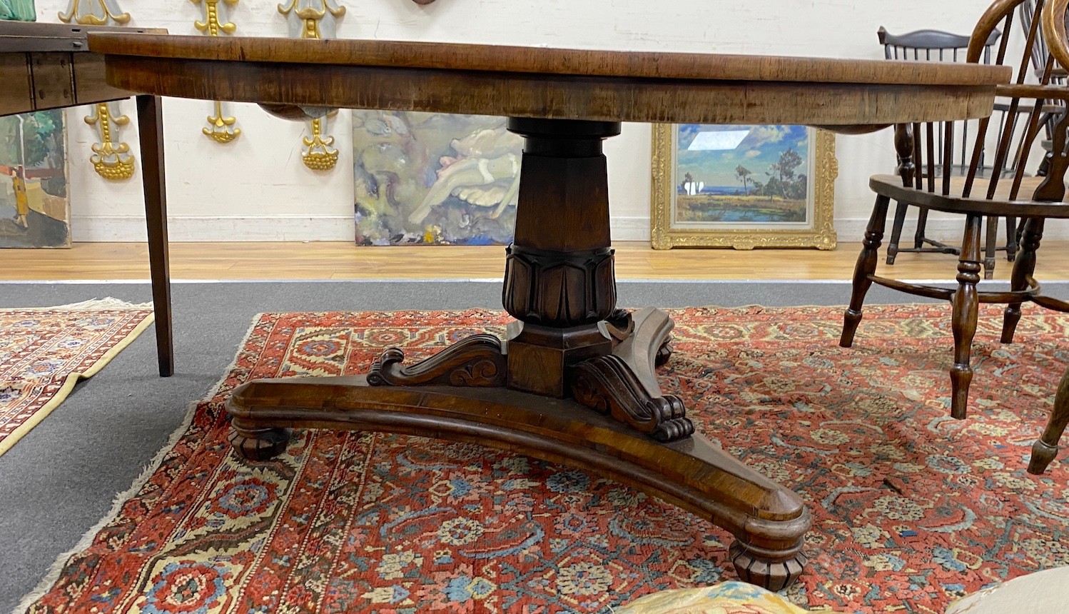 A William IV circular rosewood tilt top breakfast table, diameter 135cm, height 72cm